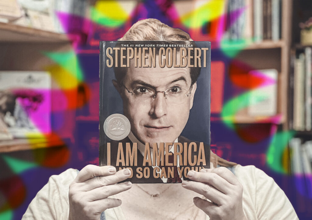 Brianne holds up a copy of Stephen Colbert's book so his face perfectly covers where her face should be. Colors burst from behind her.